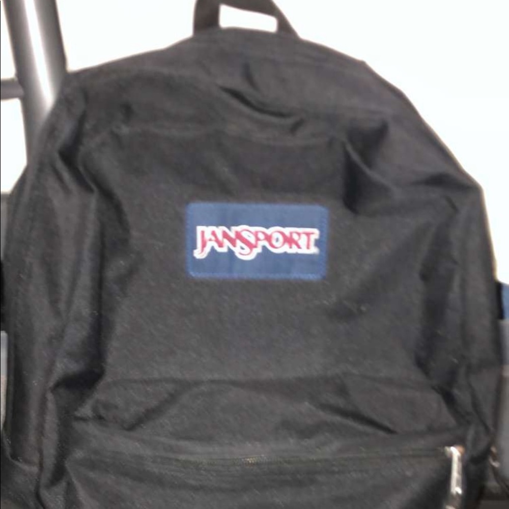 All black jansport backpack